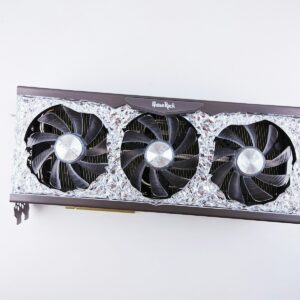 a close up of a computer fan on a wall